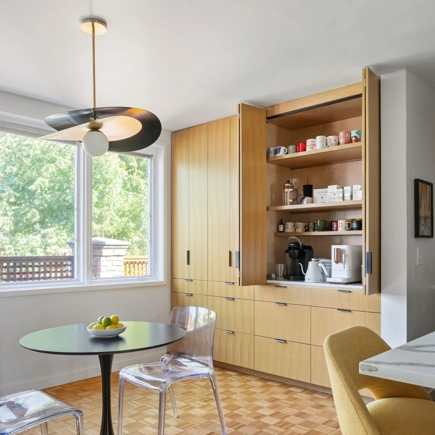 Bar area with custom wood cabinetry and open shelving, Brentwood