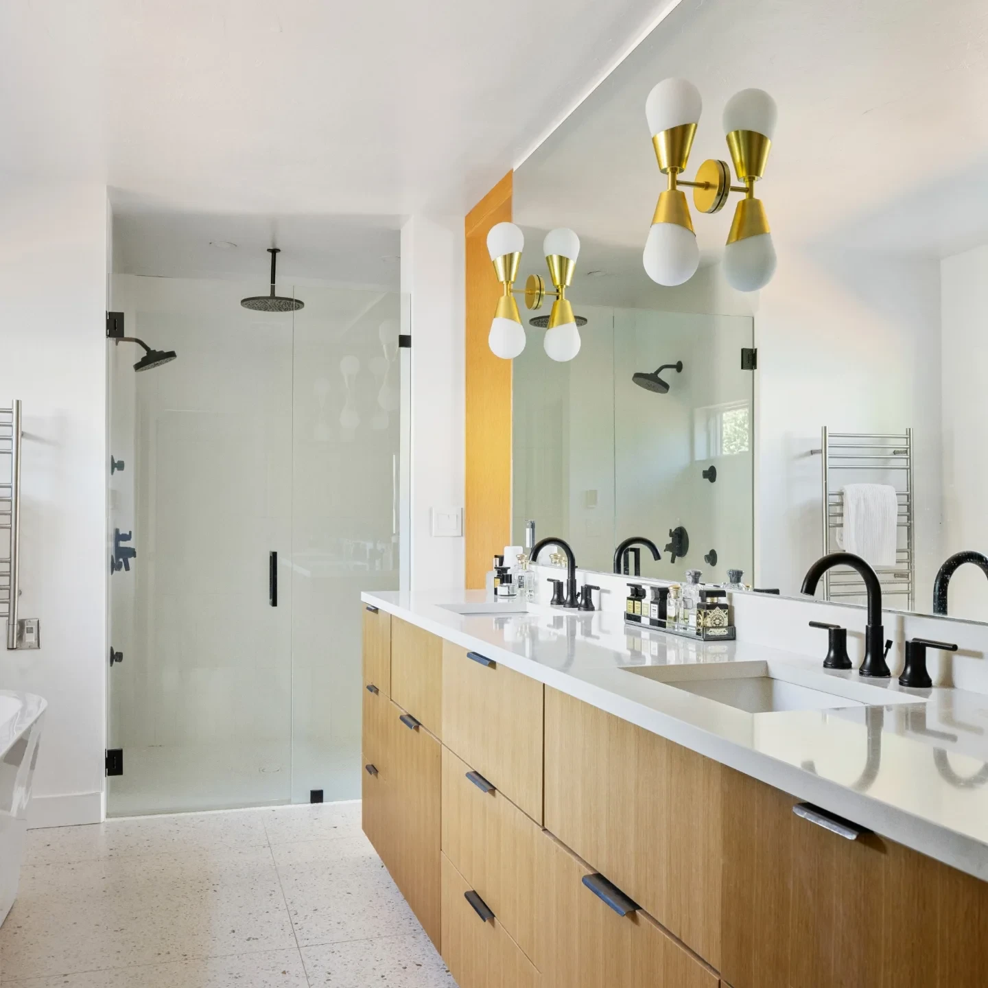 Floating bathroom vanity with custom wood drawer fronts, Brentwood