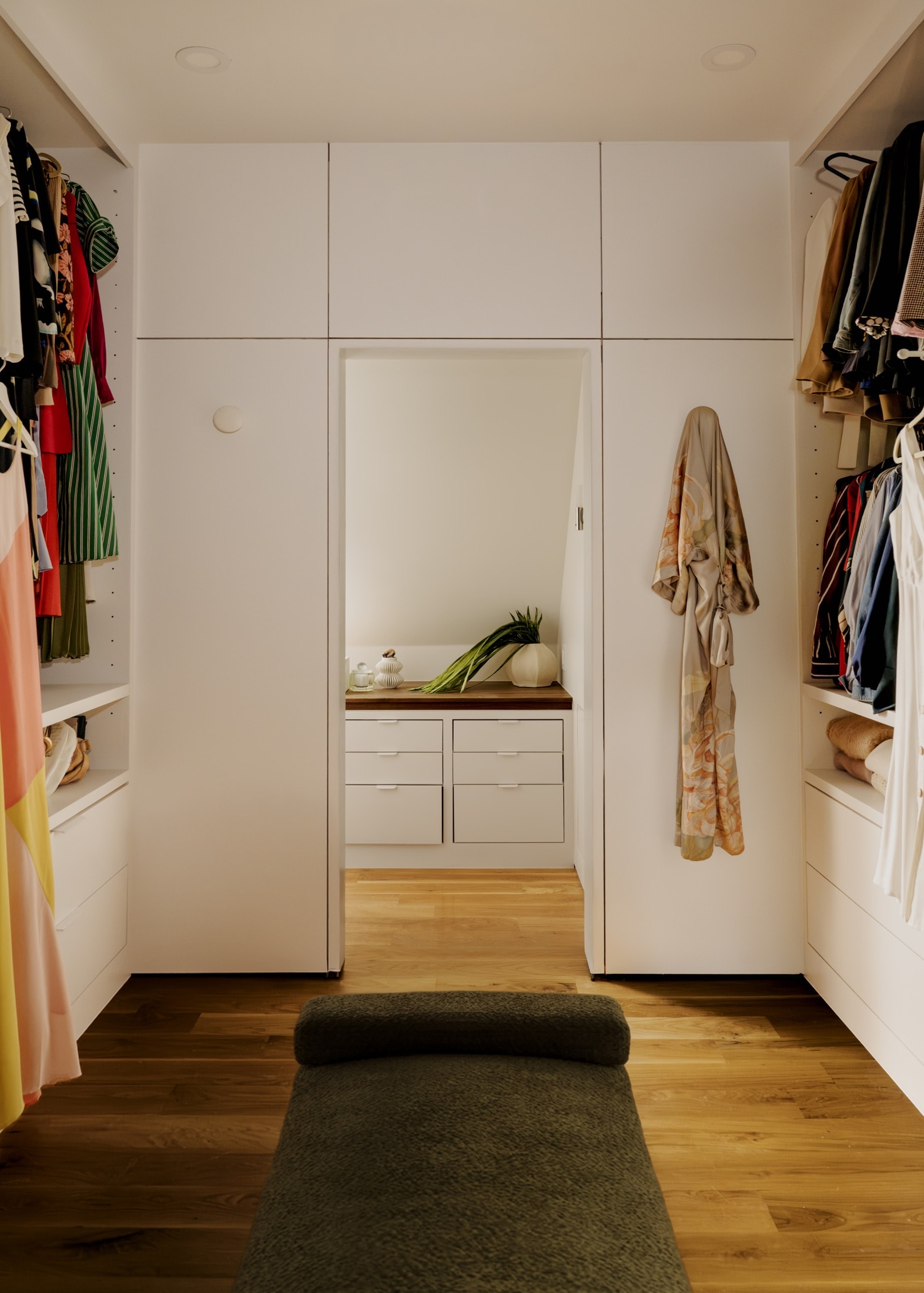 Custom walk-in closet cabinetry with drawers and hanging storage, Bryant Avenue